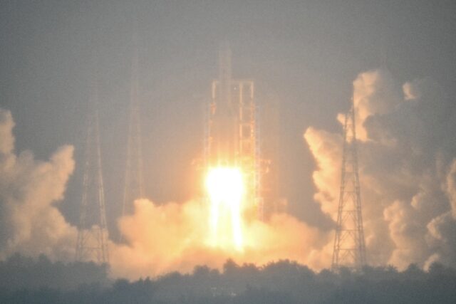 A rocket carrying a lunar probe lifts off in May for the far side of the Moon, a world fir