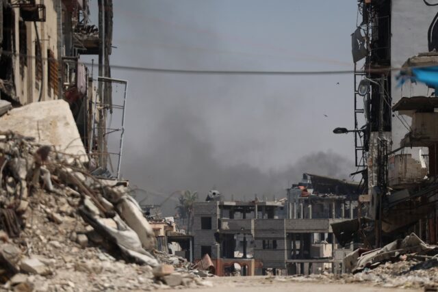 Smoke billows from an area targeted by Israeli bombardment during battles in the Gaza City