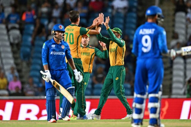 South Africa's Marco Jansen (left) celebrates after having Afghanistan's Nangeyalia Kharot