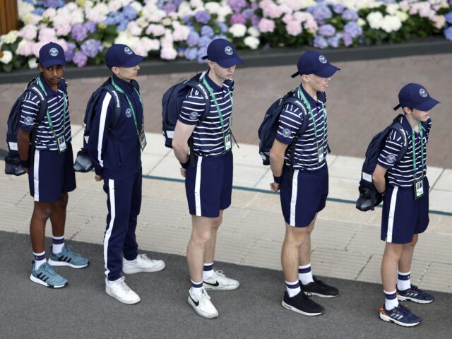 Ball boys line up within the grounds during day one of the 2022 Wimbledon Championships at