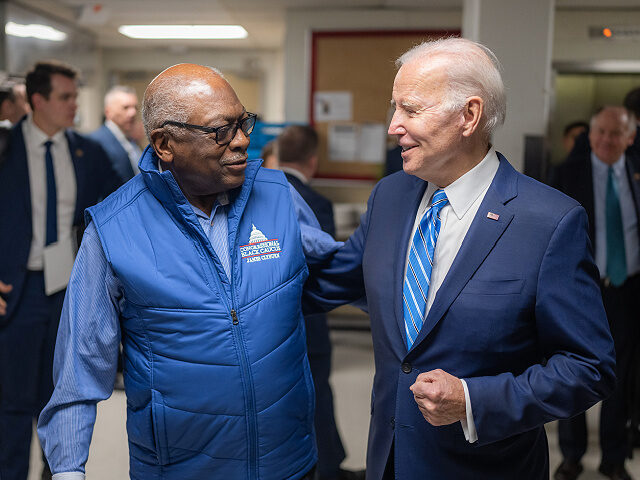 President Joe Biden greets Rep. Jim Clyburn (D-SC) at the Democratic House Caucus Retreat,