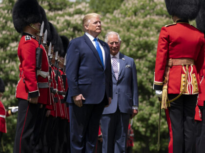 President Donald J. Trump joined by the Prince Charles inspects the Guard of Honor during