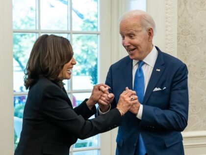 President Joe Biden shares a lighter moment with Vice President Kamala Harris in the Oval