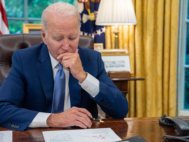 President Joe Biden talks on the phone with Canadian Prime Minister Justin Trudeau in the