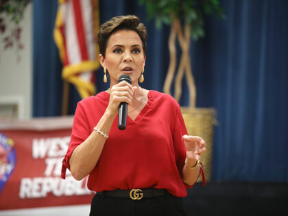 Kari Lake speaking with attendees at a meeting of the Arizona Legislative District 28 Repu