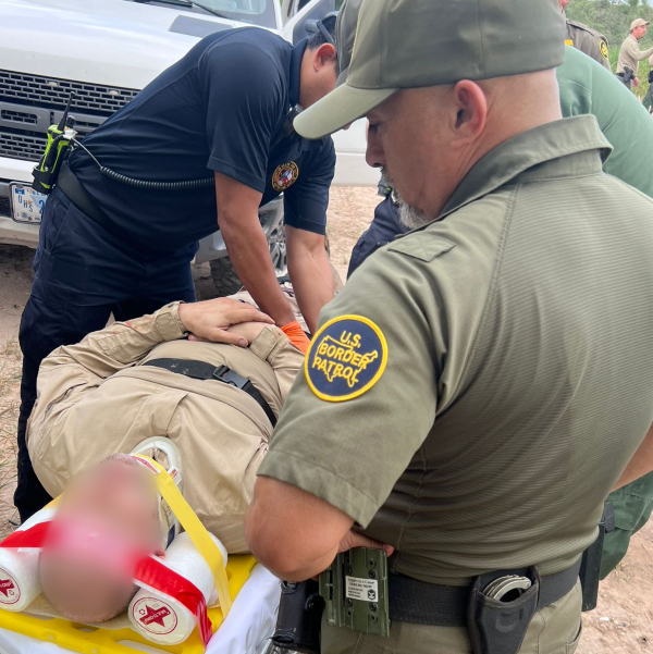 A CBP AMO agent/pilot receives medical attention after returning to Texas from Mexico. (Law Enforcement Source)