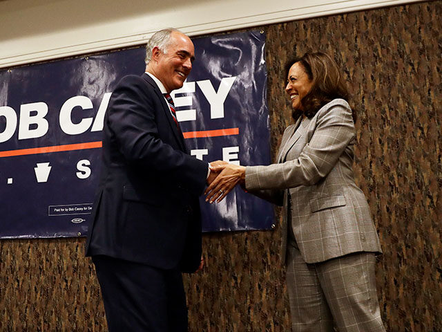 Sen. Bob Casey, D-Pa., left, greets Sen. Kamala Harris, D-Calif., after a general election