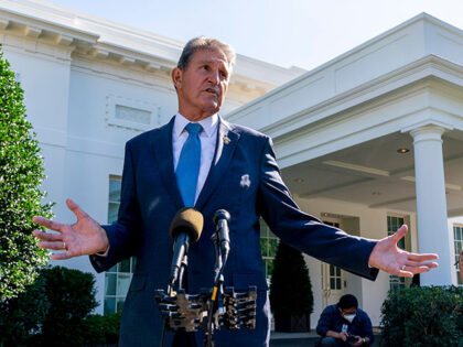 Sen. Joe Manchin, D-W.Va., speaks to reporters outside the West Wing of the White House in