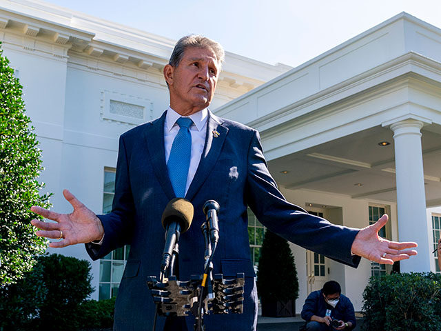 Sen. Joe Manchin, D-W.Va., speaks to reporters outside the West Wing of the White House in