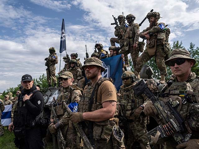 Fighters of Russian Volunteer Corps prepares for the press conference not far from the bor