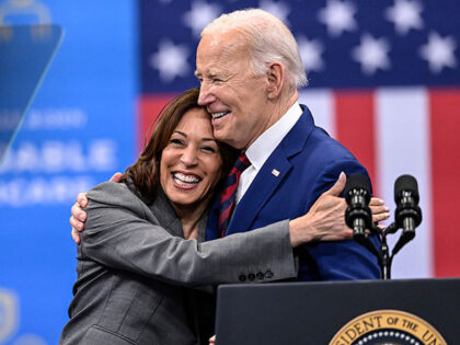 Vice President Kamala Harris embraces President Joe Biden after a speech on healthcare in
