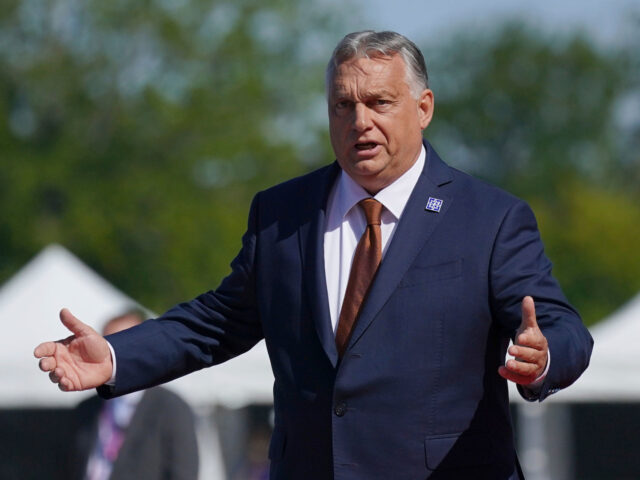 Prime Minister of Hungary Viktor Orban speaks to the media as he arrives to attend the Eur