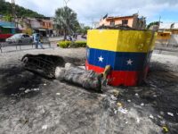 Venezuelans Topple Statues of Hugo Chavez in Nationwide Anti-Socialist Protests
