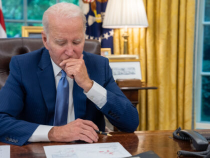 President Joe Biden talks on the phone with Canadian Prime Minister Justin Trudeau in the
