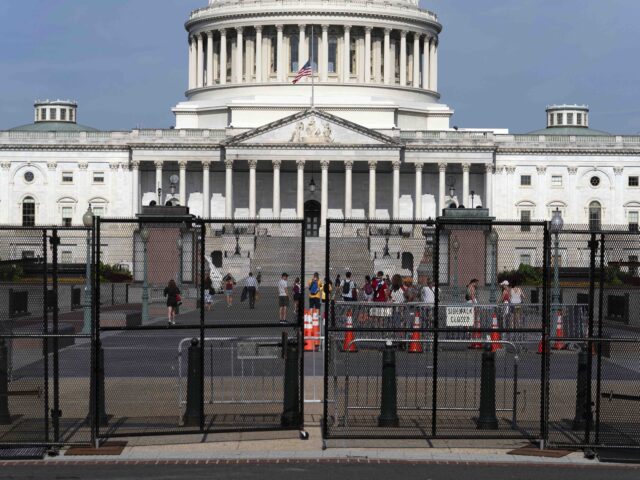 The U.S. Capitol is seen behind a security fence a day before of Israel's Prime Minis