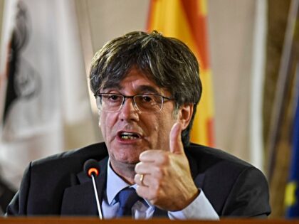 FILE - Catalan leader Carles Puigdemont speaks at a press conference in Alghero, Italy, Oc