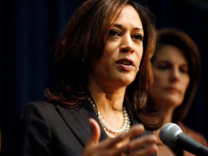 California Attorney General Kamala D. Harris , left, is joined by Nevada Attorney General