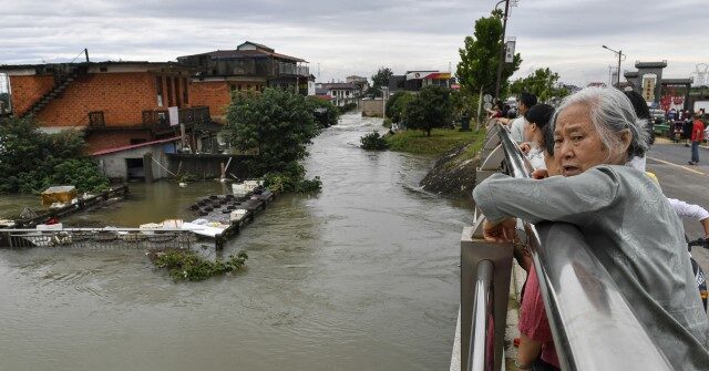 Thousands Evacuated, Crops Threatened as Summer Floods Submerge East China