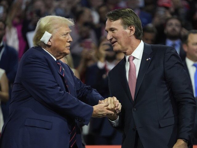 Republican presidential candidate former President Donald Trump shakes hands with Virginia