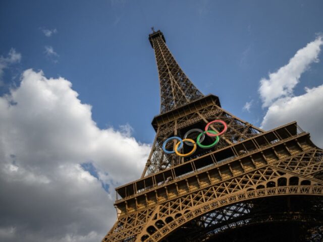A photo shows the Olympic rings on the Eiffel Tower ahead of the Paris 2024 Olympic Games