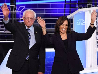 Democratic presidential hopefuls US Senator for Vermont Bernie Sanders (L) and US Senator