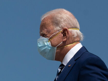 Democratic Presidential Candidate Joe Biden wears two masks as he arrives in Fort Lauderda