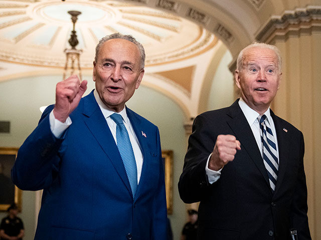 Senate Majority Leader Chuck Schumer (D-NY) and U.S. President Joe Biden speak briefly to