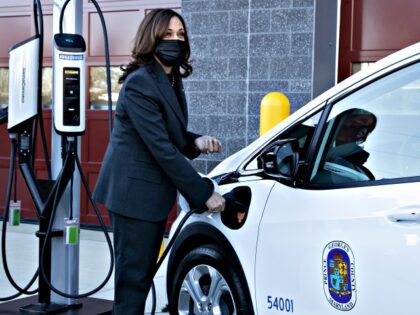 U.S. Vice President Kamala Harris receives a briefing on electric vehicle investments in t
