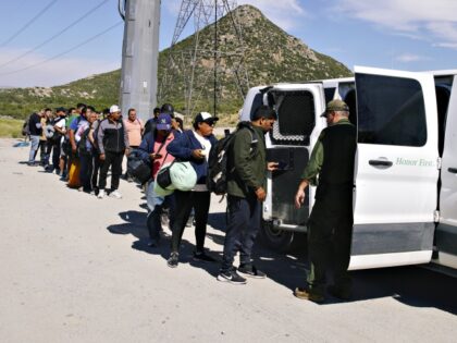 JACUMBA HOT SPRINGS, CALIFORNIA - JUNE 9: Migrants are processed by the US Border Patrol a