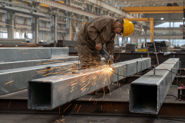 HEFEI, CHINA - JUNE 10, 2024 - A worker is producing steel structure products at a steel s