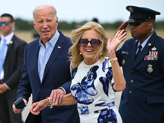 President Joe Biden and First Lady Jill Biden step off Air Force One upon arrival at Franc