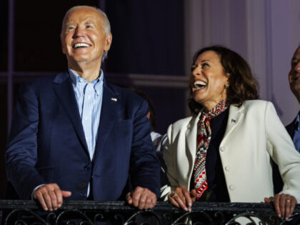 WASHINGTON, DC - JULY 04: President Joe Biden and Vice President Kamala Harris laugh as th