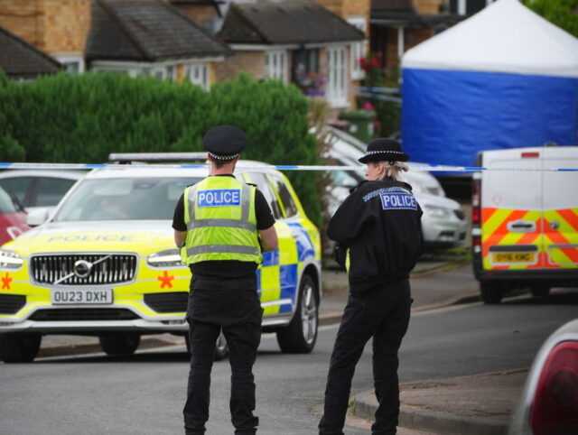 Police at the scene in Ashlyn Close, Bushey, Hertfordshire, where three women, who police