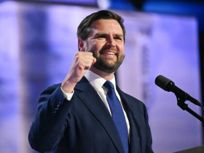 US Senator from Ohio and 2024 Republican vice presidential candidate J.D. Vance waves from