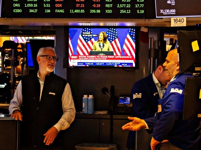 A news broadcast displayed on a monitor on the floor of the New York Stock Exchange (NYSE)