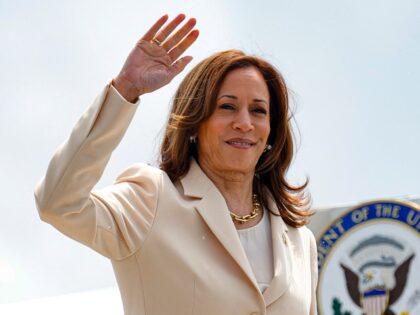 US Vice President and Democratic Presidential candidate Kamala Harris waves as she boards