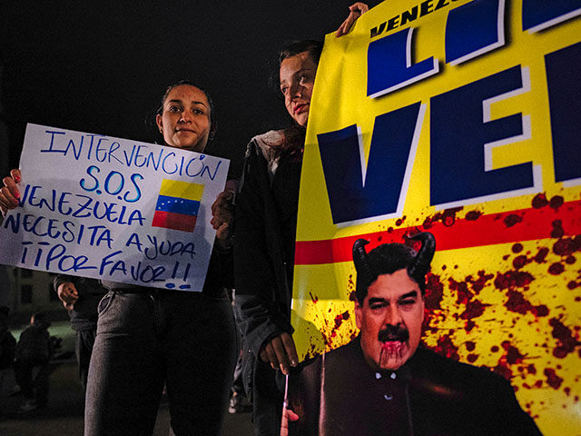 Demonstrators protest against Venezuelan President Nicolas Maduro's questioned presidentia