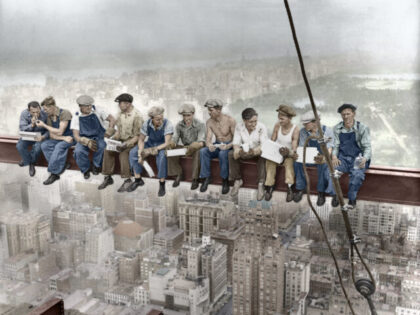 29 Sep 1932, Manhattan, New York City, New York State, USA --- Construction workers eat th