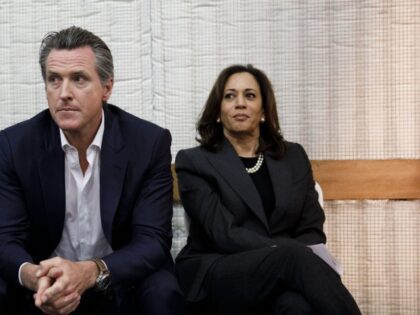 Gavin Newsom, Democratic candidate for governor of California, center, sits next to his wi