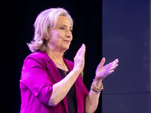 Hillary Clinton, former US secretary of state, left, applauds Olena Zelenska, first lady o