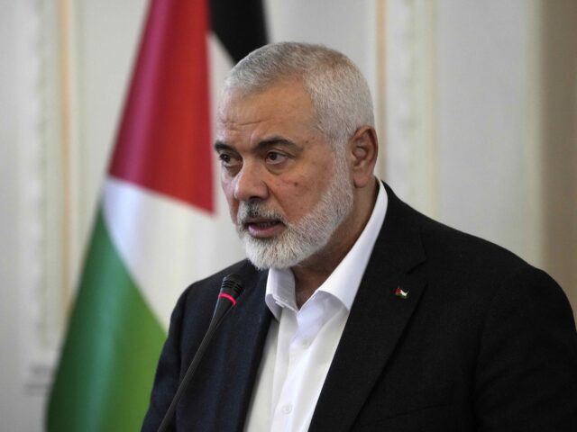 FILE - Hamas chief Ismail Haniyeh speaks during a press briefing after his meeting with Ir