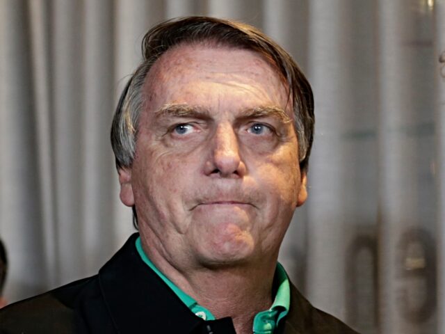 FILE - Brazil's former President Jair Bolsonaro prepares to speak to the press in Belo Hor