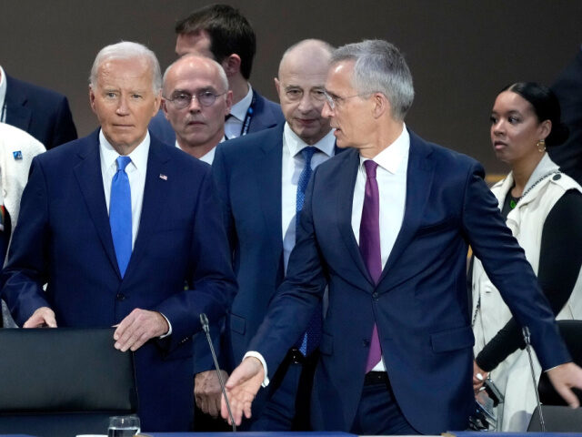 US President Joe Biden, second left, and Jens Stoltenberg, secretary general of the North