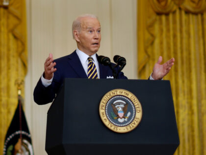 U.S. President Joe Biden talks to reporters during a news conference in the East Room of t