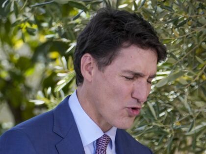 Canada's Prime Minister Justin Trudeau, left, is welcomed by Italian Prime Minister G