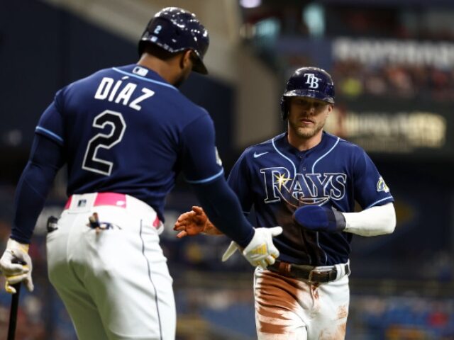 ST PETERSBURG, FL - JULY 5: Taylor Walls #6 of the Tampa Bay Rays high fives Yandy Diaz #2