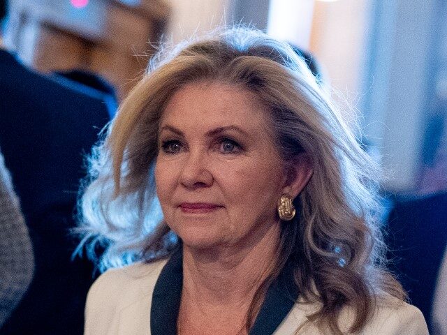 Sen. Marsha Blackburn (R-TN) walks into the Senate Chamber on Capitol Hill on April 23, 20