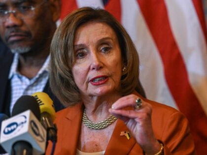US Speaker of the House, Nancy Pelosi speaks to media together with a congressional envoy
