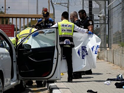 Israeli Police and ZAKA emergency service work at the scene of an attempted stabbing attac