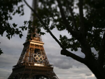 This photograph taken with a tilt-shift lens shows the Olympic Rings seen on the Eiffel To